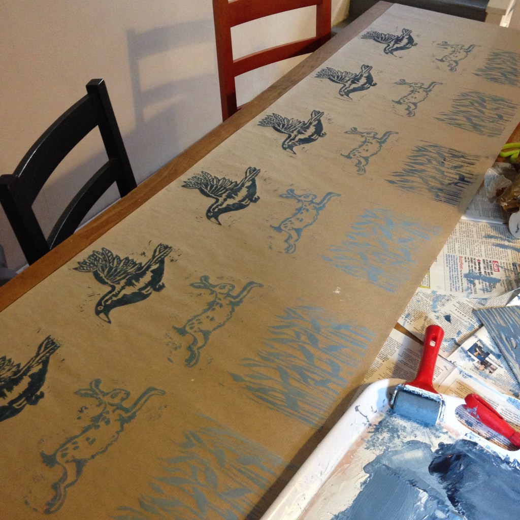 Crow and hare linocut by Myfanwy Tristram